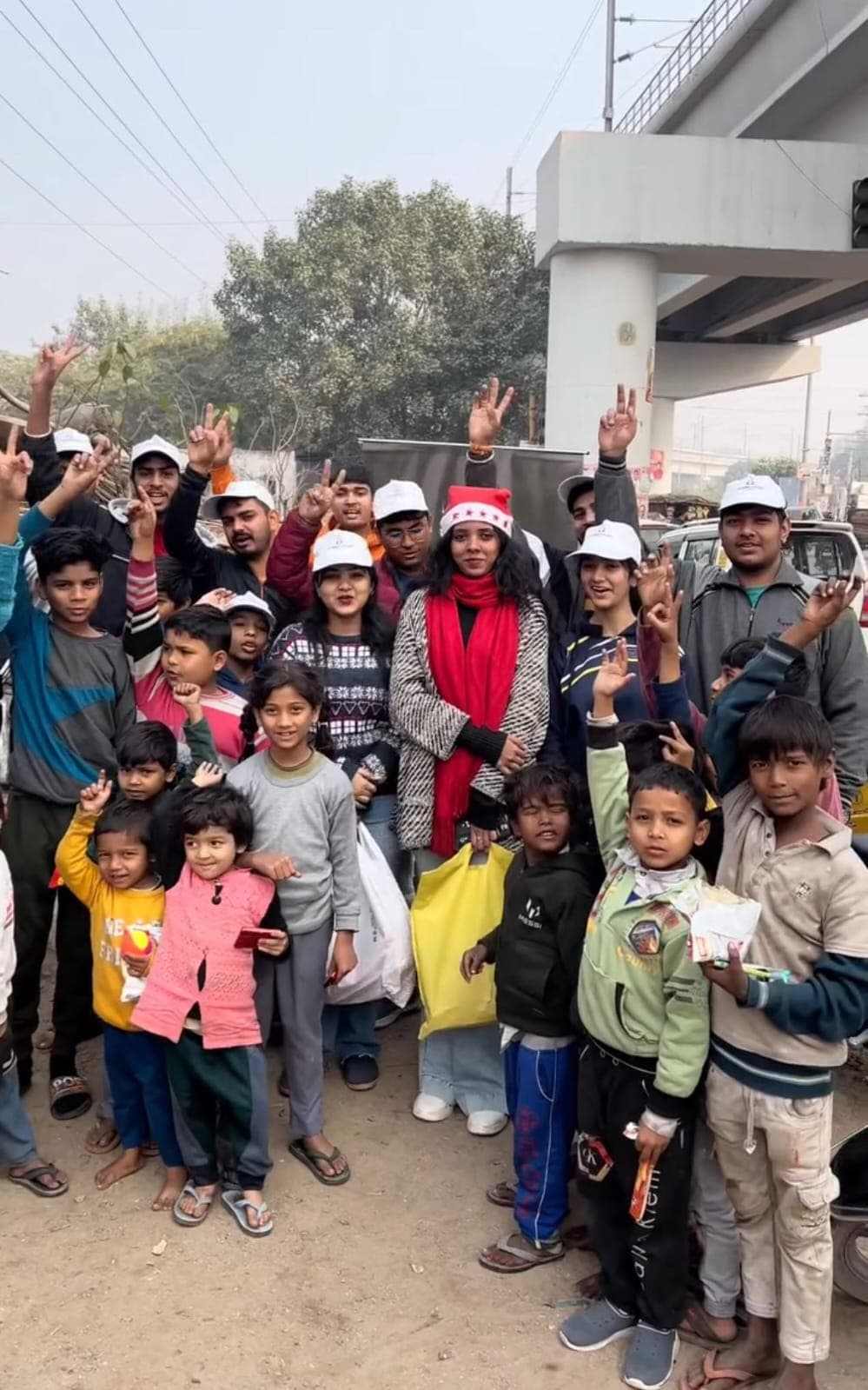 Volunteers tutoring children in a classroom setting